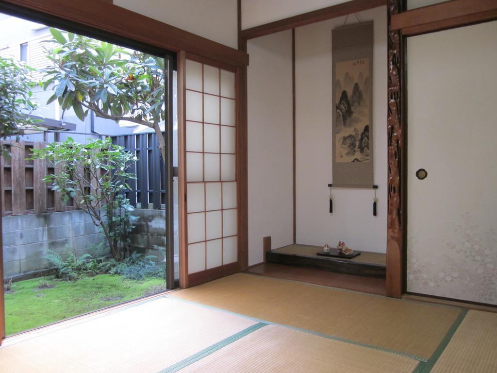 Enman Guest House Osaka Moriguchi Екстериор снимка