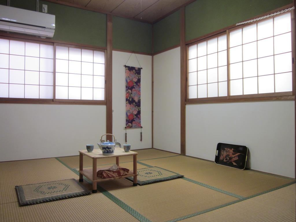 Enman Guest House Osaka Moriguchi Екстериор снимка
